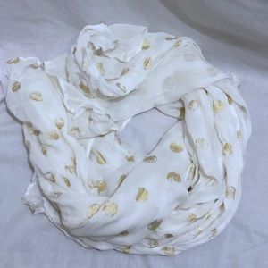 White scarf with gold polka dots